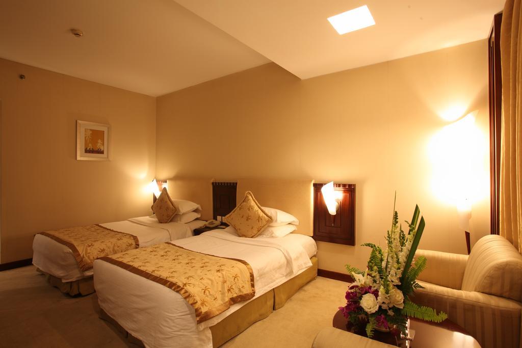 Beijing Wuhuan Hotel Quarto foto