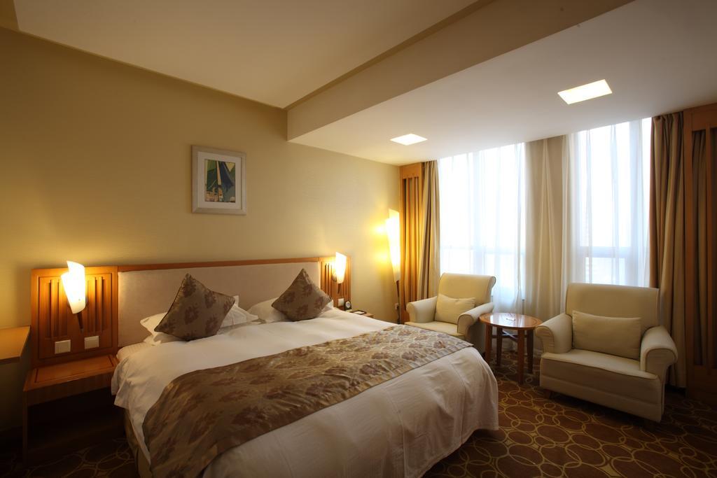 Beijing Wuhuan Hotel Quarto foto