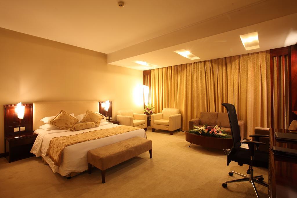 Beijing Wuhuan Hotel Quarto foto