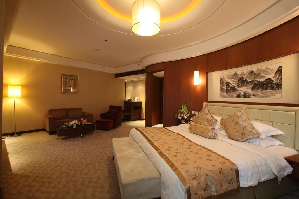Beijing Wuhuan Hotel Quarto foto