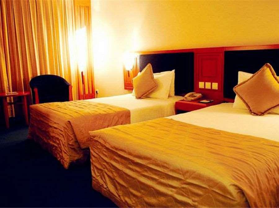 Beijing Wuhuan Hotel Quarto foto