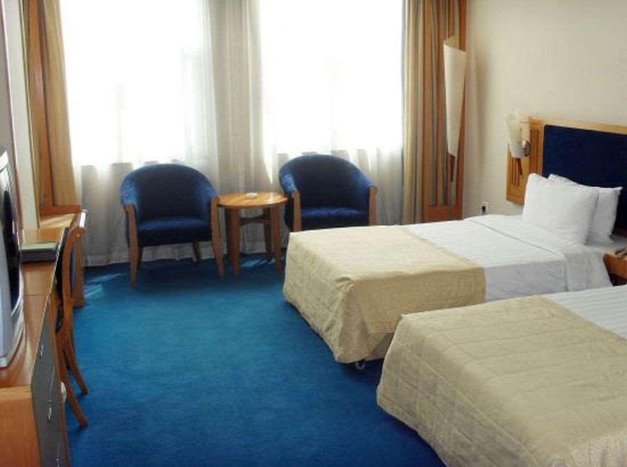 Beijing Wuhuan Hotel Quarto foto
