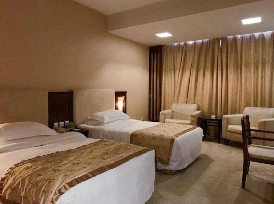 Beijing Wuhuan Hotel Quarto foto