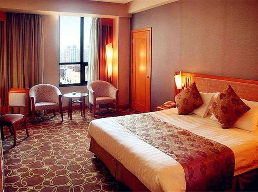 Beijing Wuhuan Hotel Quarto foto