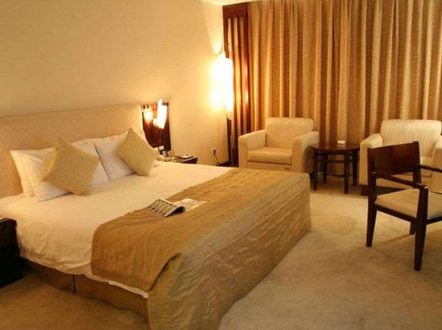 Beijing Wuhuan Hotel Quarto foto